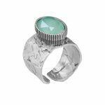 silver ring with wide band and crystal