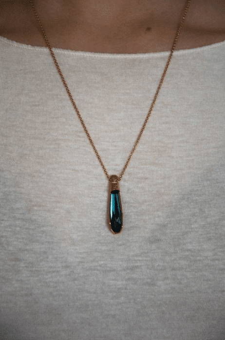 silver artistic necklace with crystal