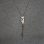 silver unique necklace with bright crystal