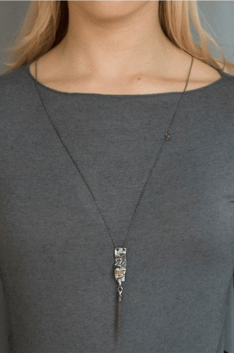 artistic necklace with bright crystal