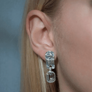silver earrings with bright crystal