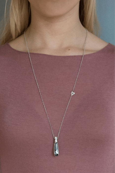 silver artistic necklace with big crystal