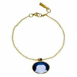 Artistic silver bracelet with blue crystal