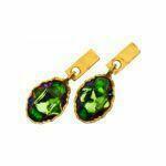Artistic silver earrings with green crystals