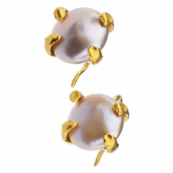 Artistic silver ring with pink pearl