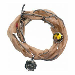 Handmade silk bracelet with green crystal