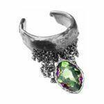 Artistic silver ring with green crystal