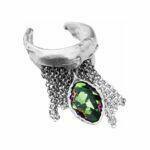 Artistic silver ring with green crystal