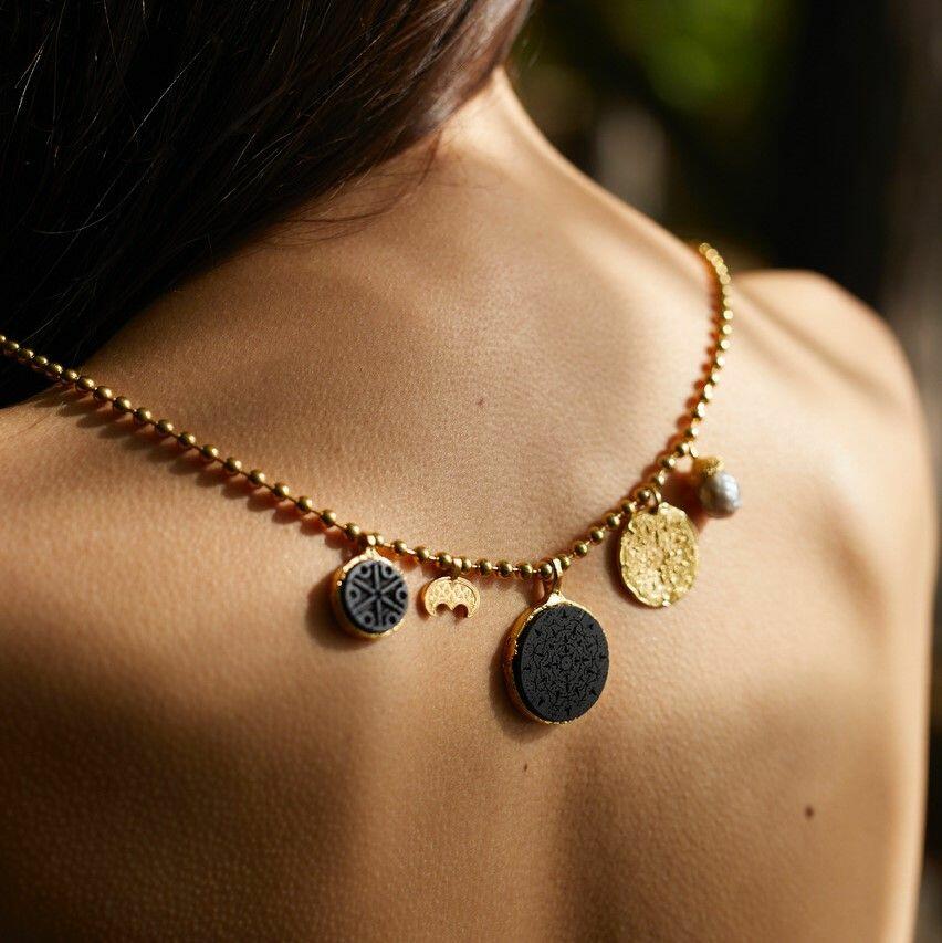 silver necklace with black oak
